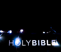 holy Bible and fairy lights 