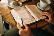 Studying the Bible over coffee.