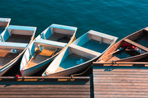 row boats at a dock
