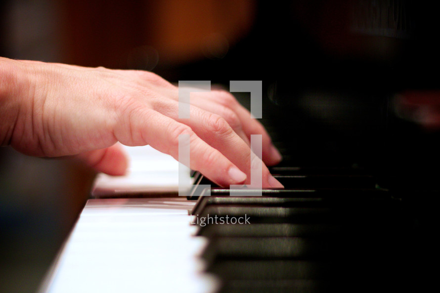hands on piano keys 