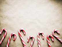 candy cane border on brown paper 