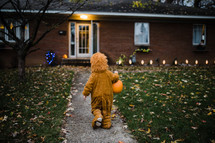 a child trick or treating 