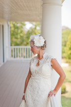 Bride standing on a large porch