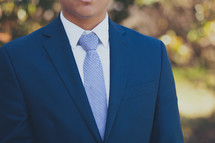torso of a man in a business suit 