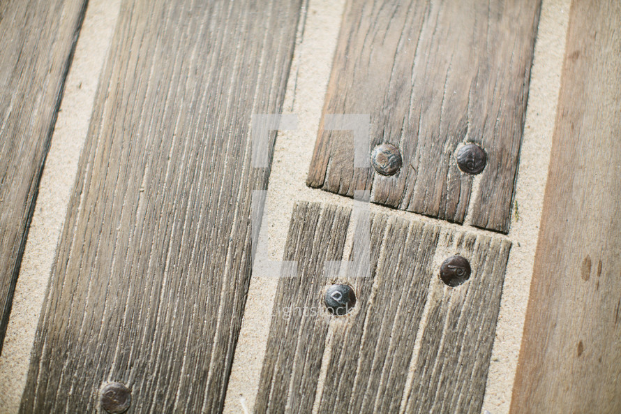 nails in wood planks