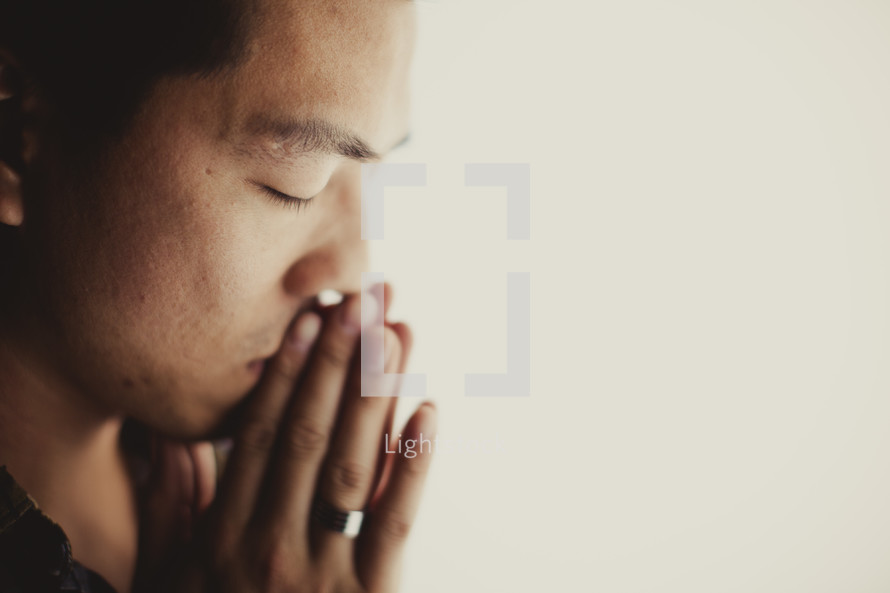 A man deep in prayer