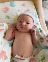newborn baby with umbilical clip 
