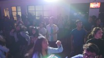 jumping and cheering youth during a worship service 