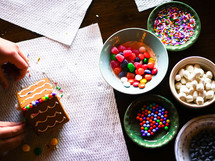 bowls of candy for decorating a gingerbread house 