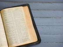 an old Bible on a front porch 