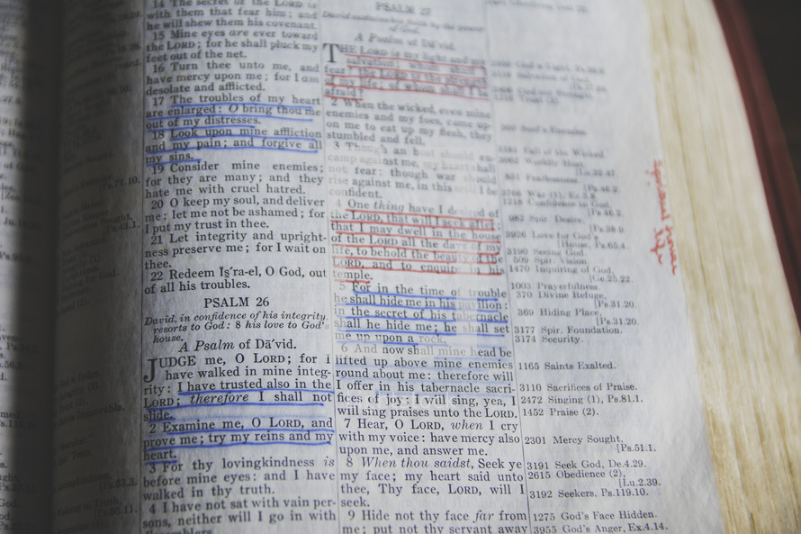 underlined scripture on the pages of a Bible 