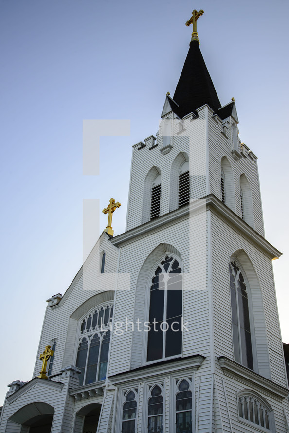 steeple on a white church 