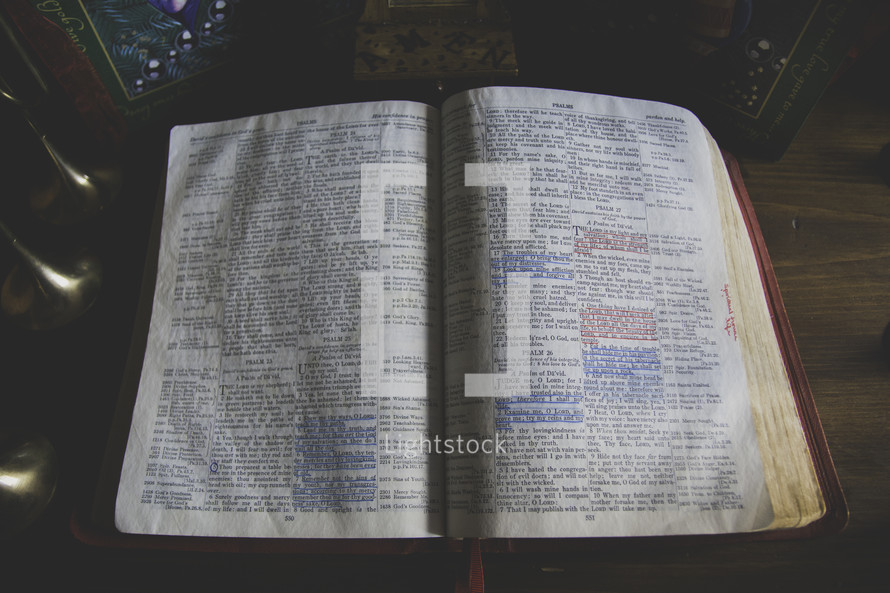 underlined scripture on the pages of a Bible 