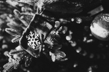 Christmas ornaments on a tree in black and white 