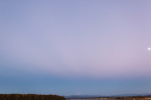 Mountain range on the horizon at sunrise.