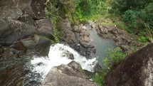 looking down a waterfall in hawaii 