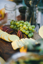 cheese and cracker plate and grapes 