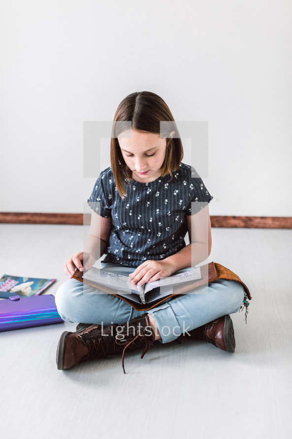 child reading at home 