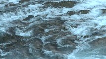 water rushing over rocks 