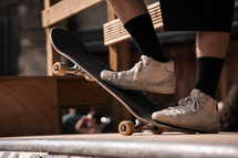 Skateboard on a skate ramp, extreme sports summer photo