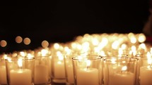 Glowing prayer candles. 