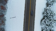 car driving on a road in winter 