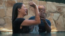 a woman being baptized 