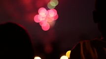Bokeh fireworks and silhouettes