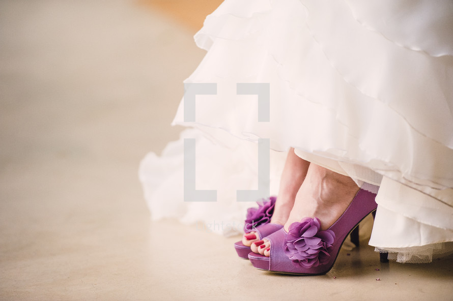 bride with fuchsia high heel shoes 