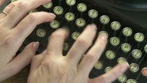 typing on a typewriter 