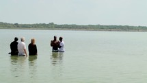 Baptism at the lake.