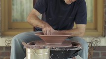 man at a potters wheel 
