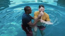 a man being baptized 