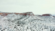 snow on desert canyon cliffs 