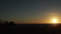 beach pier at sunset 