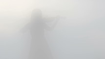 image of a woman in fog 