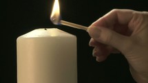Lighting a candle 