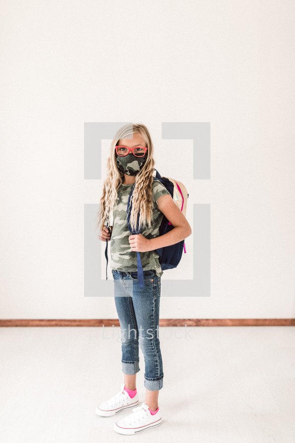preteen girl in a mask 