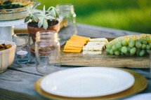 thanksgiving place settings on an outdoor picnic table 