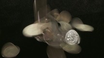 pouring coins 