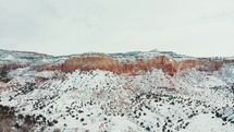 snow on desert canyon cliffs 