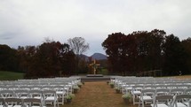 An outdoor wedding setup before the ceremony. 