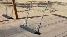 empty swinging swing 