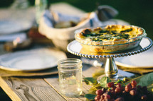 spinach quiche and place settings 