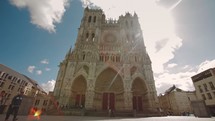 Timelapse of traffic in front of Amiens Cathedral in France.