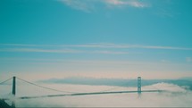 Mist rolling in across the Golden Gate Bridge.