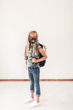 preteen girl in a mask 