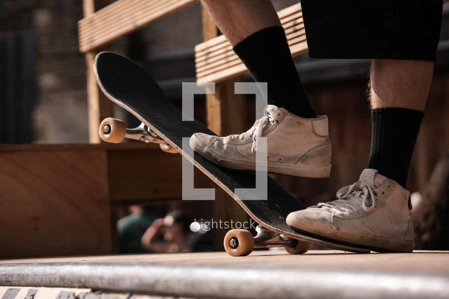 Skateboard on a skate ramp, extreme sports summer photo