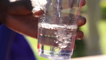 filling a cup with filtered water 