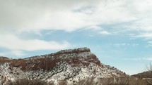 snow on desert cliffs 